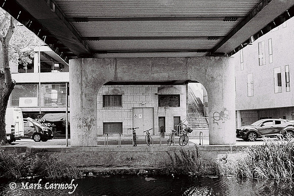 Under the bridge.
